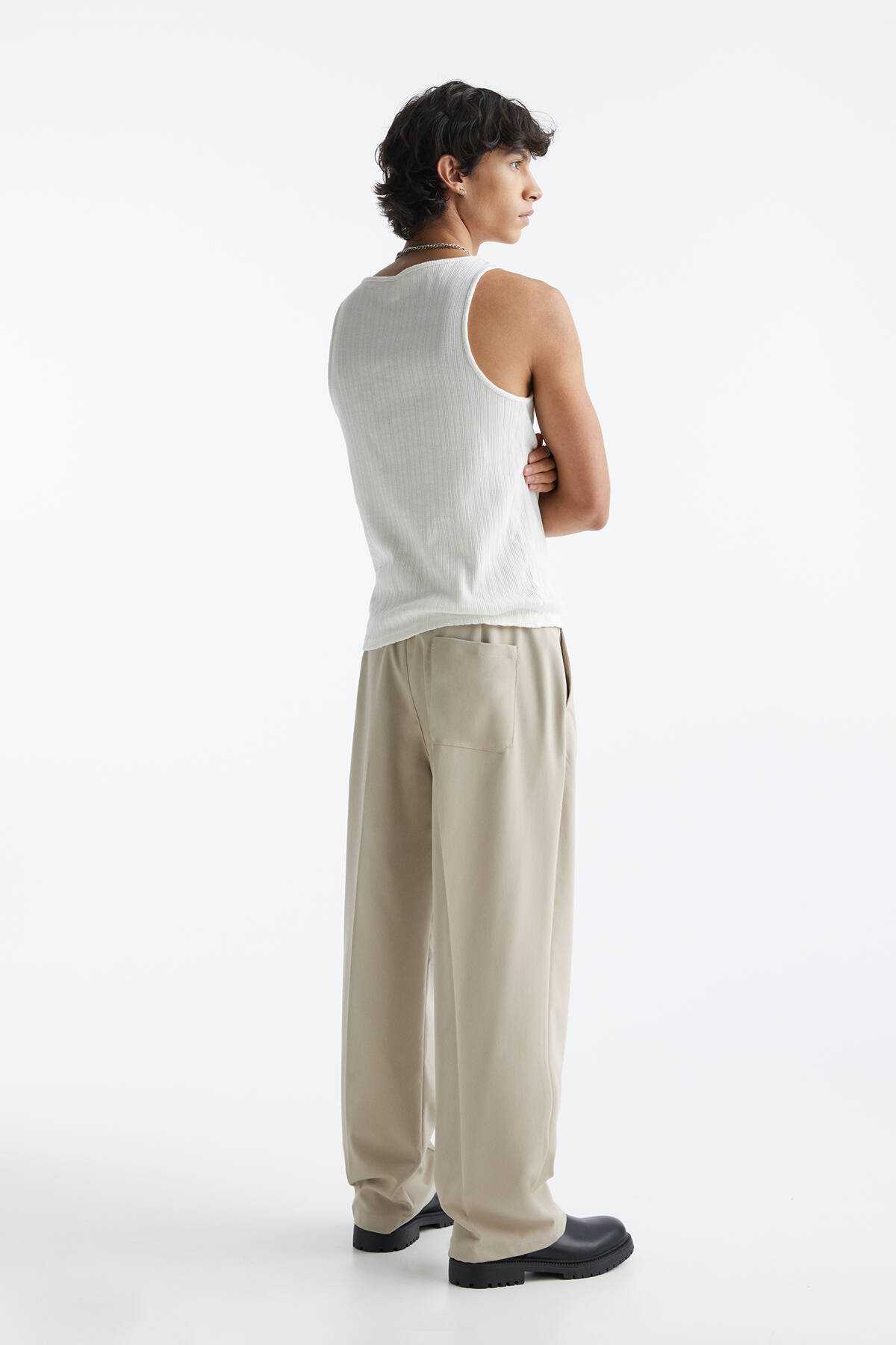 شلوار پارچه ای ساق گشاد