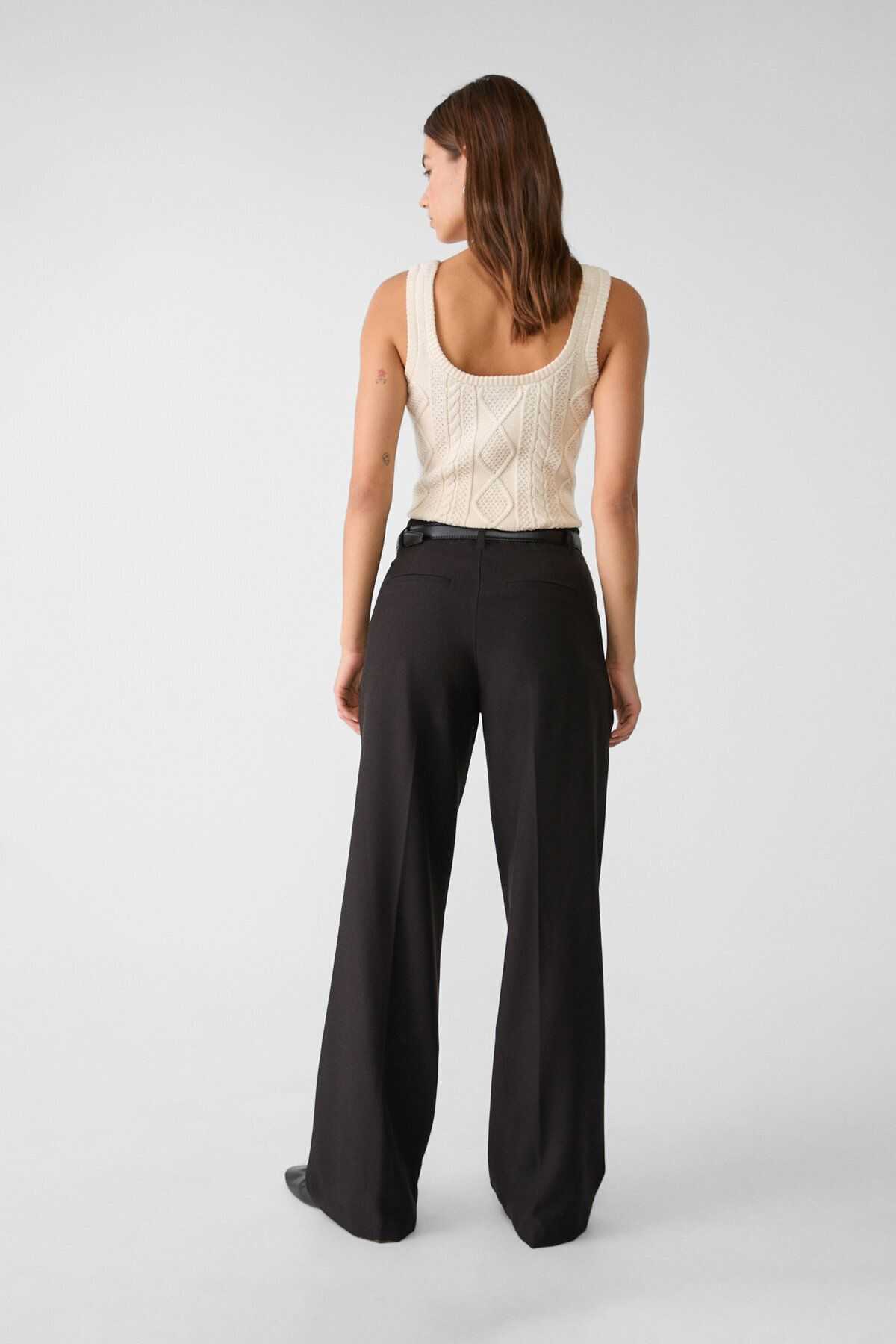 شلوار پارچه ای با کمربند و روان