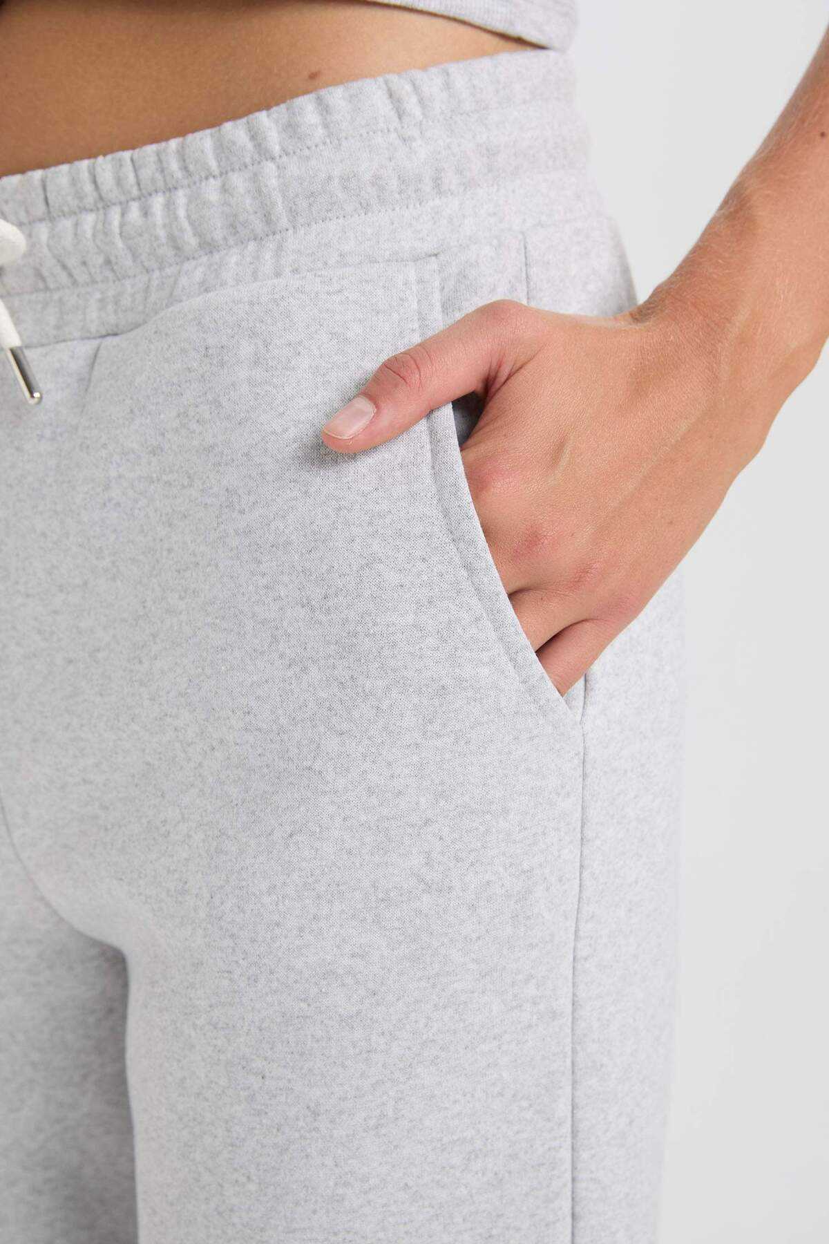 شلوار ورزشی ساده و ضخیم جوگر با کاف کمری الاستیک و جیب