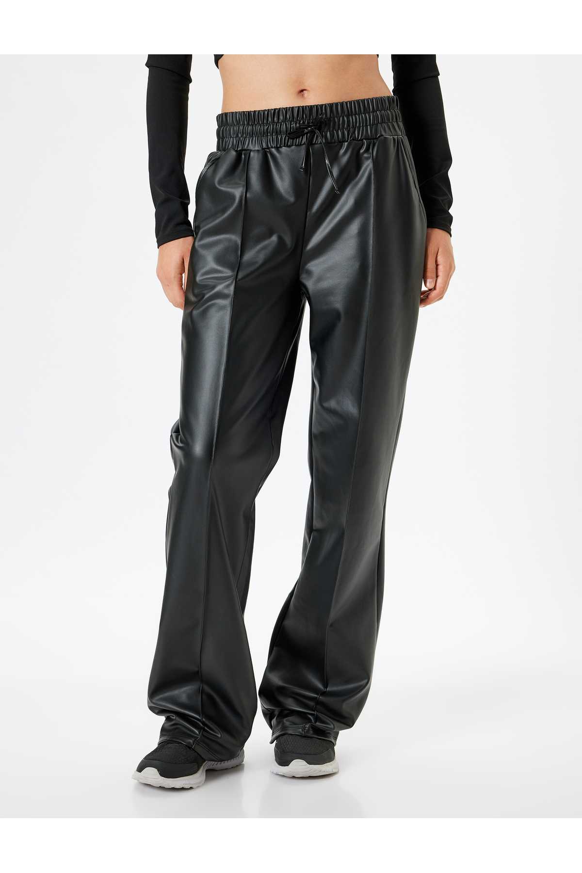 شلوار گرمکن چرم مصنوعی توری دور کمر آجدار جیب راست راست