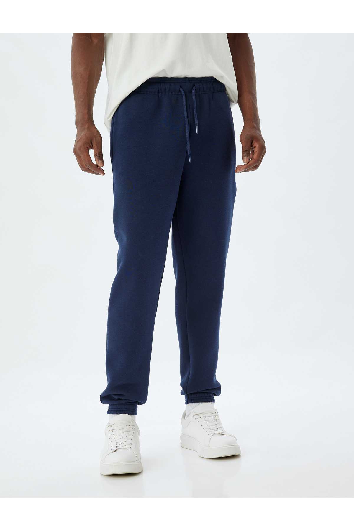 شلوار ورزشی با جیب زیپ کمر توری و ترکیب پنبه