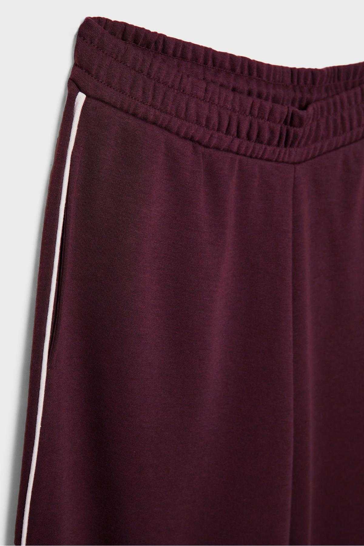 شلوار نخی گشاد با جزئیات راه راه