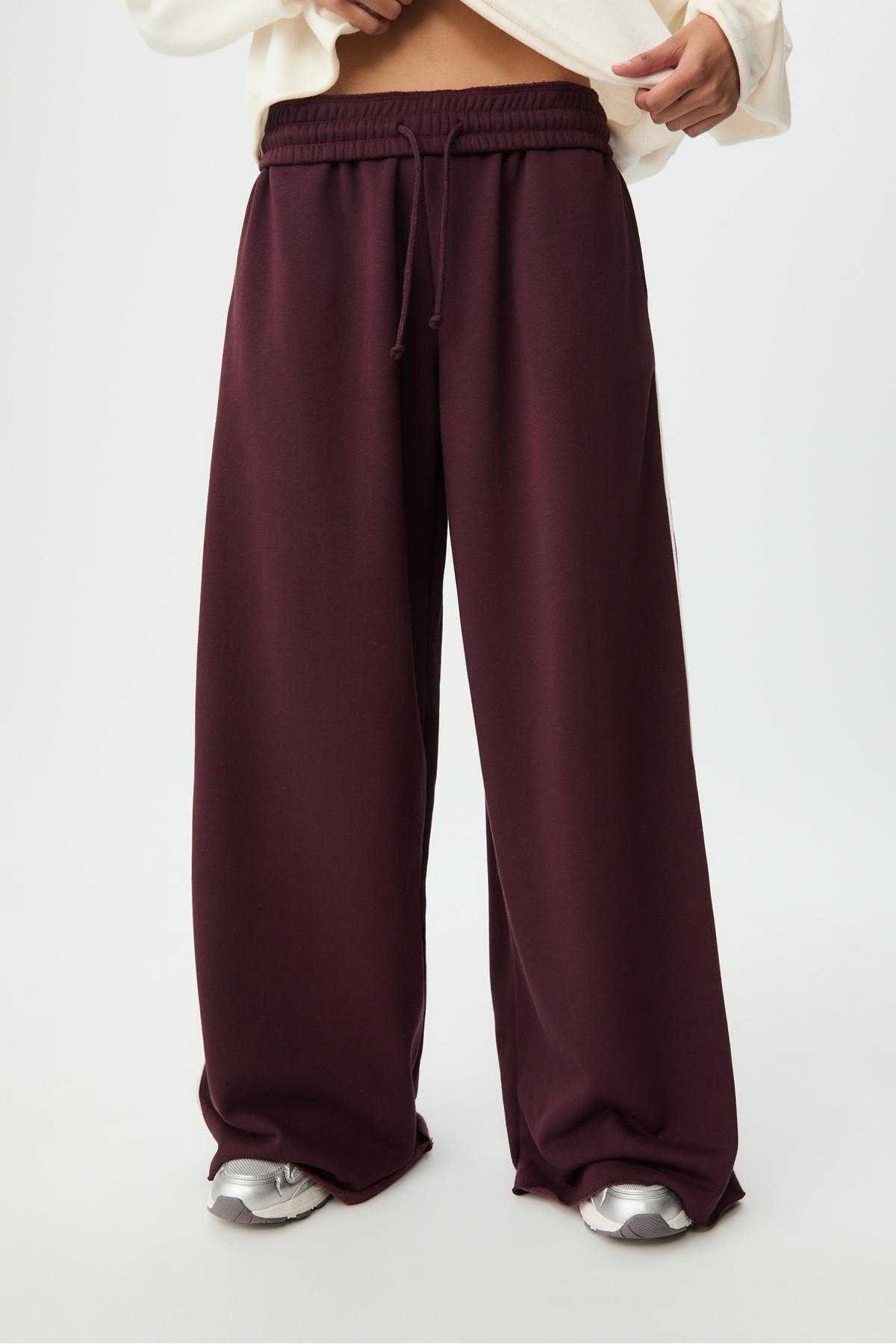 شلوار نخی گشاد با جزئیات راه راه